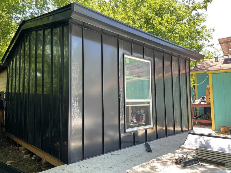 Black standing seam metal wall panels for Roof Inspection in West Carrollton
