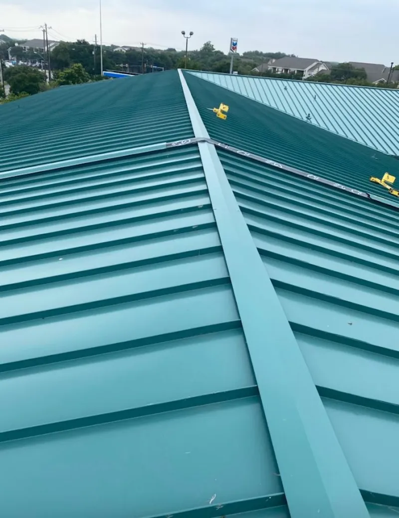 Green commercial metal roof ridge and valley for Metal Roof Repair in West Carrollton
