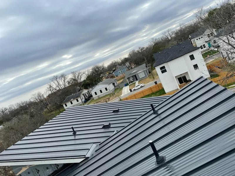 Standing seam metal roof panels with vents for Skylight Repair in West Carrollton